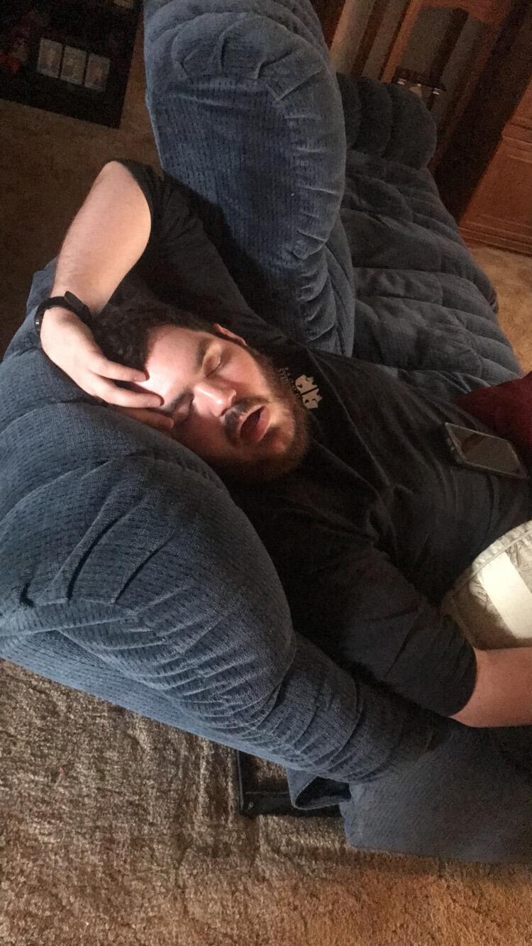 Tuckered out after an exciting morning of presents. Yes. He's snoring