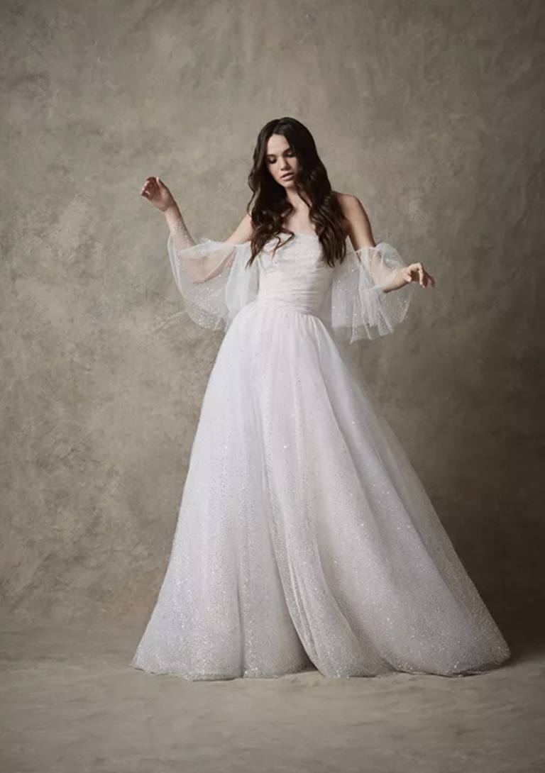 Ballgown with ruched, straight across neckline, sheer blouson sleeves and sparkle tulle fabric