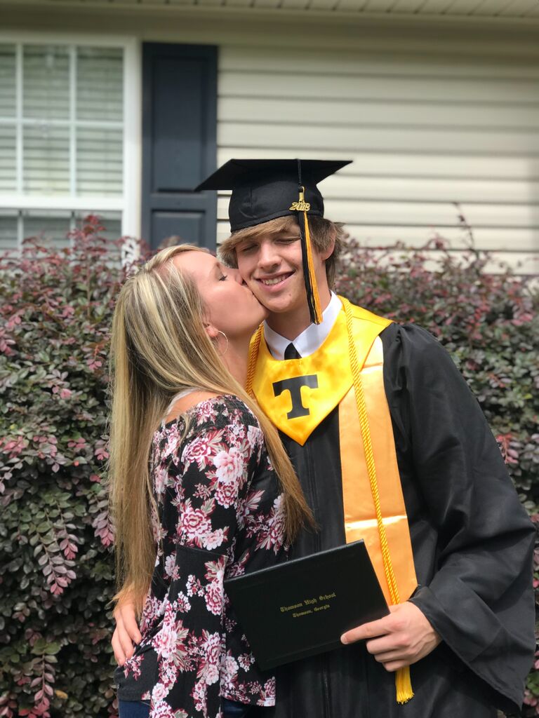 Jackson's high school graduation. Due to rain, it was moved into the gym with limited attendance. I had to watch the live stream!