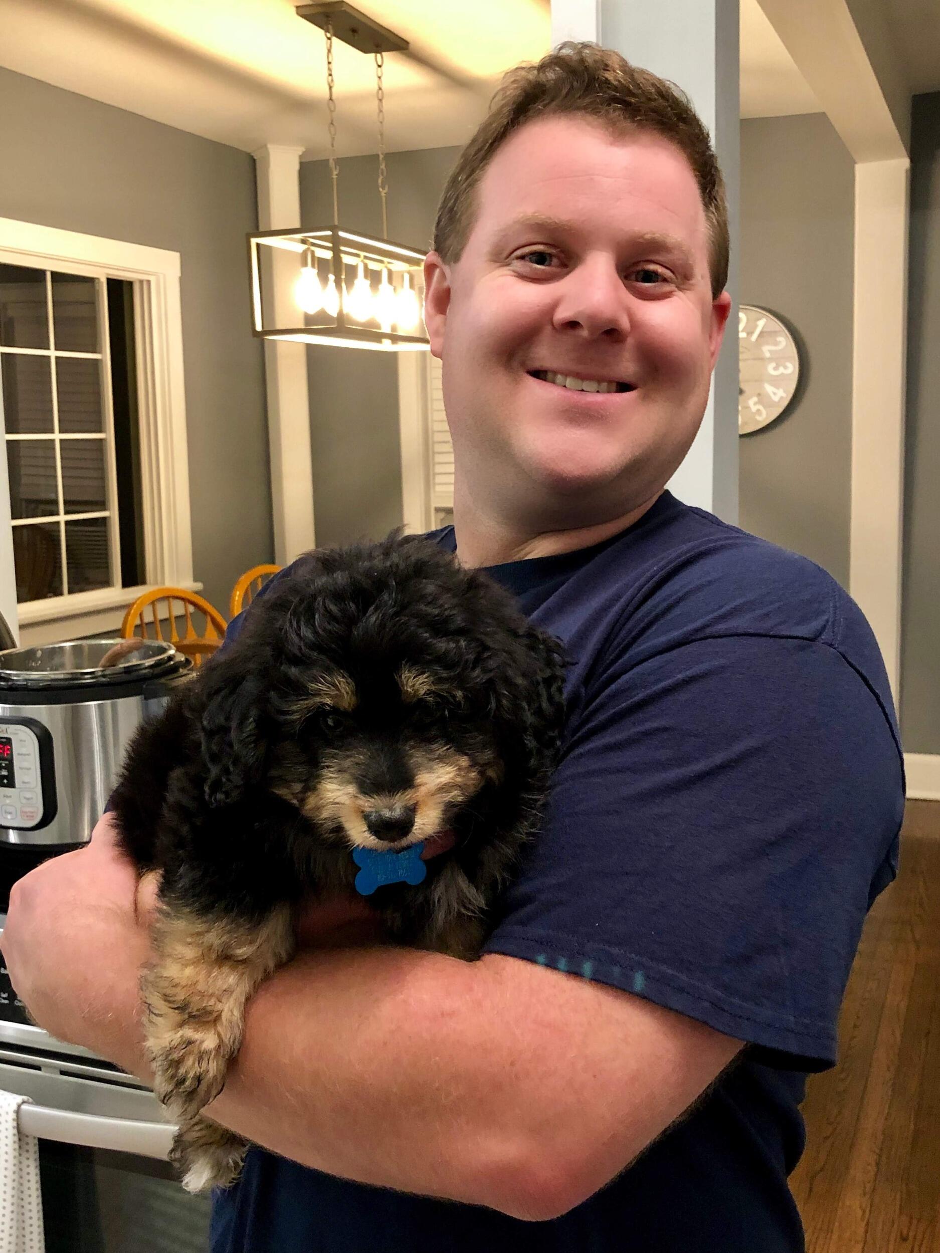 They welcomed their first fur baby, Maverick- a snuggly, laid-back Charmin bear with a little nub for a tail and a deep devotion to Megan. Always down for couch cuddles and snacks, he instantly became part of the family.