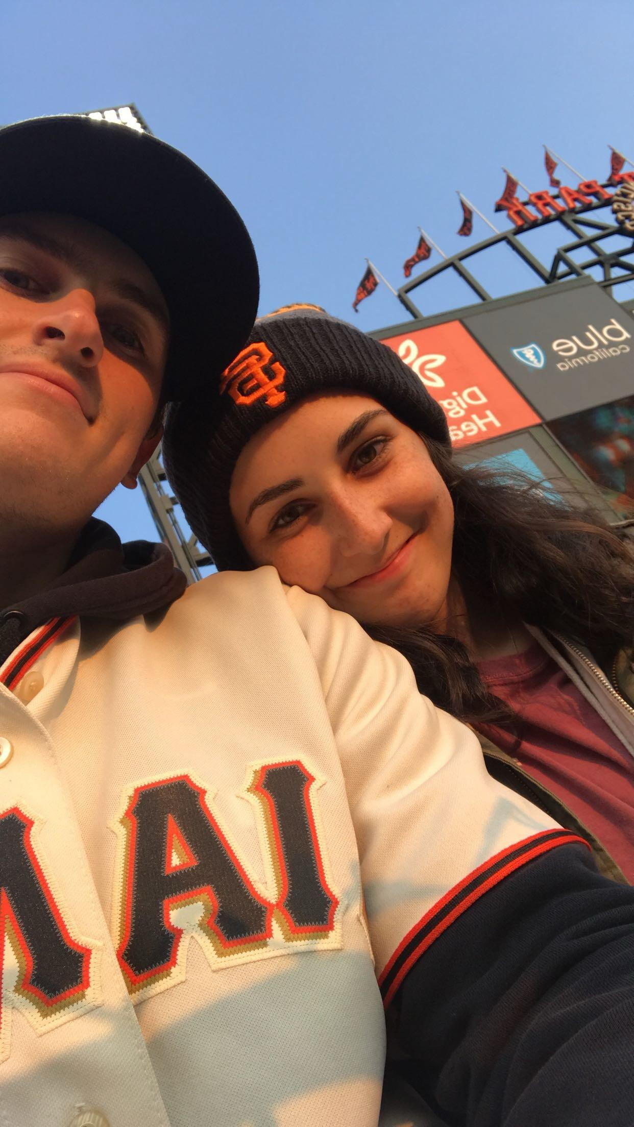 Alyssa's first Giants game. Ryan haggled to buy that beanie for $10 because Alyssa didnt understand how it could be cold during the summer in San Francisco.
