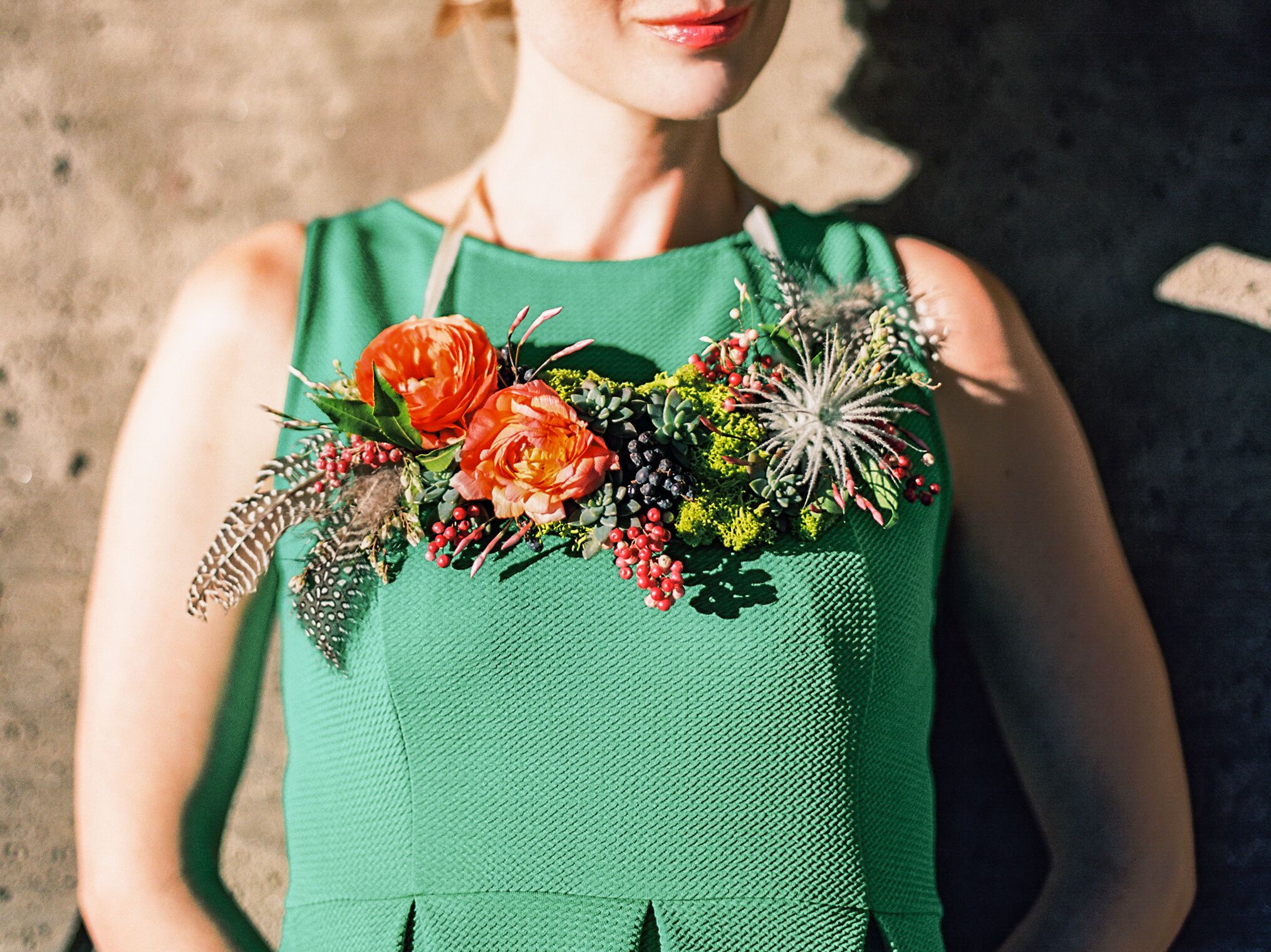 Flower necklace with ranunculus, greenery, and succulents