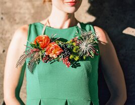 Flower necklace with ranunculus, greenery, and succulents