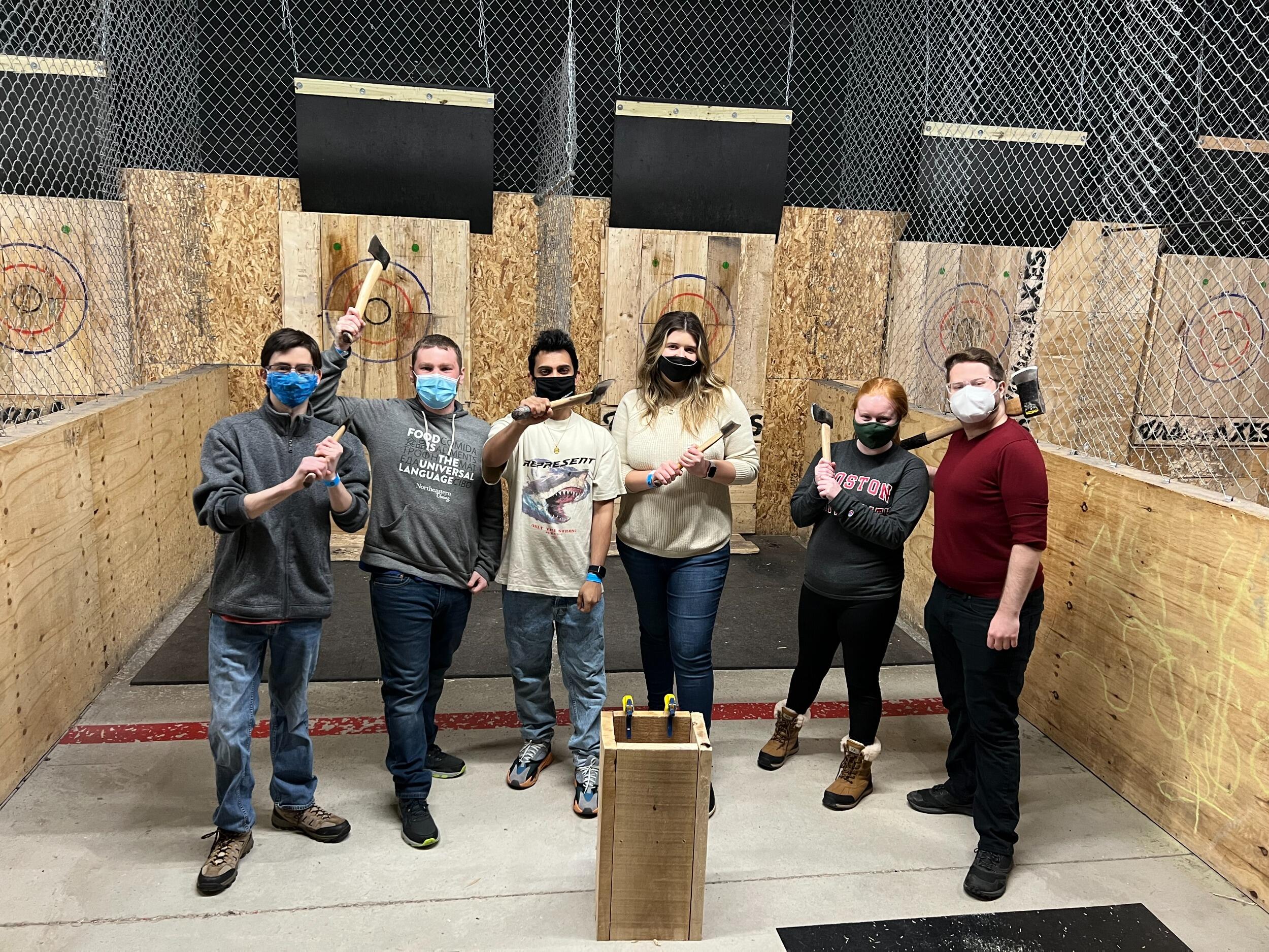 One of Zack and Maddie's earliest dates: axe throwing with Zack's roommates.