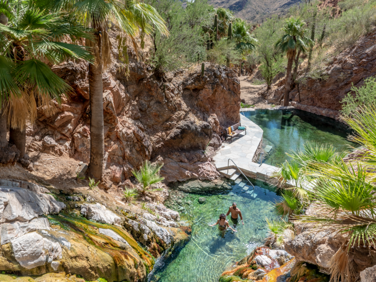 couple in hot springs at all-inclusive resort