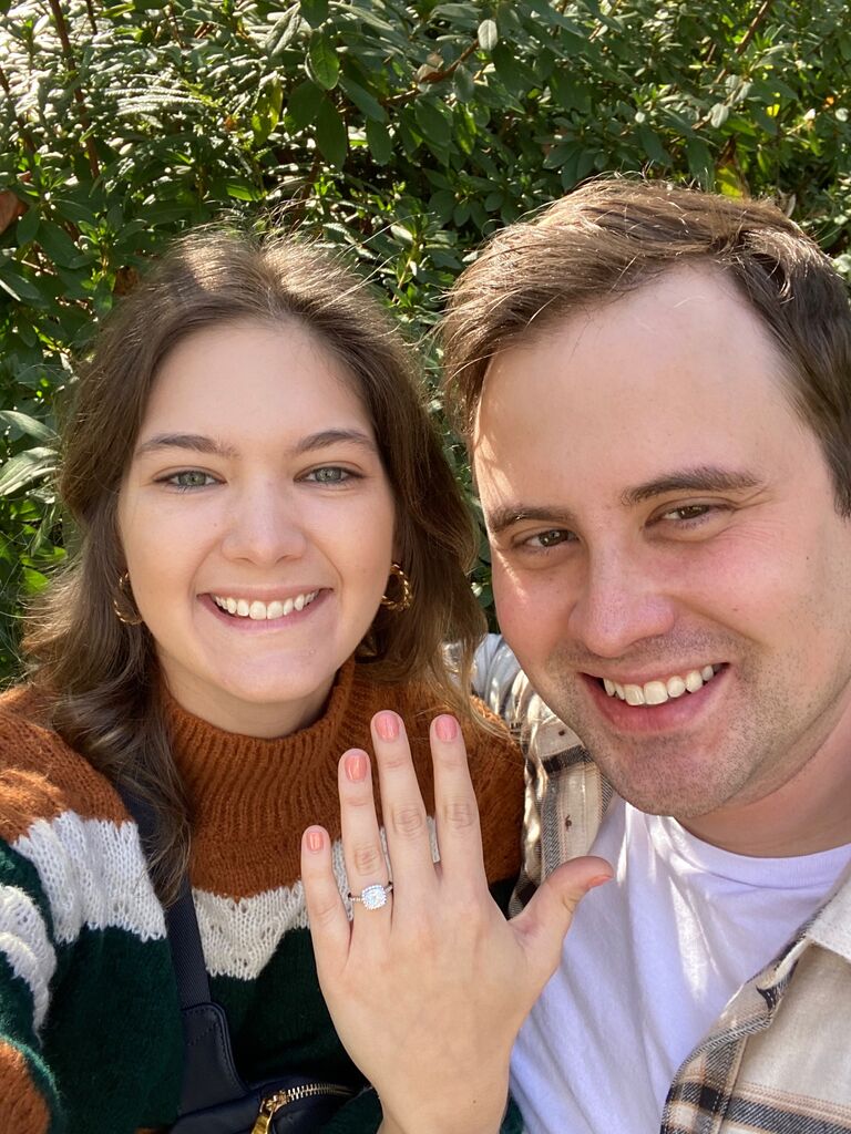 Evin and John get engaged under the bridge in Falls Park in Greenville, SC, a place they visited on John's first visit to Columbia!