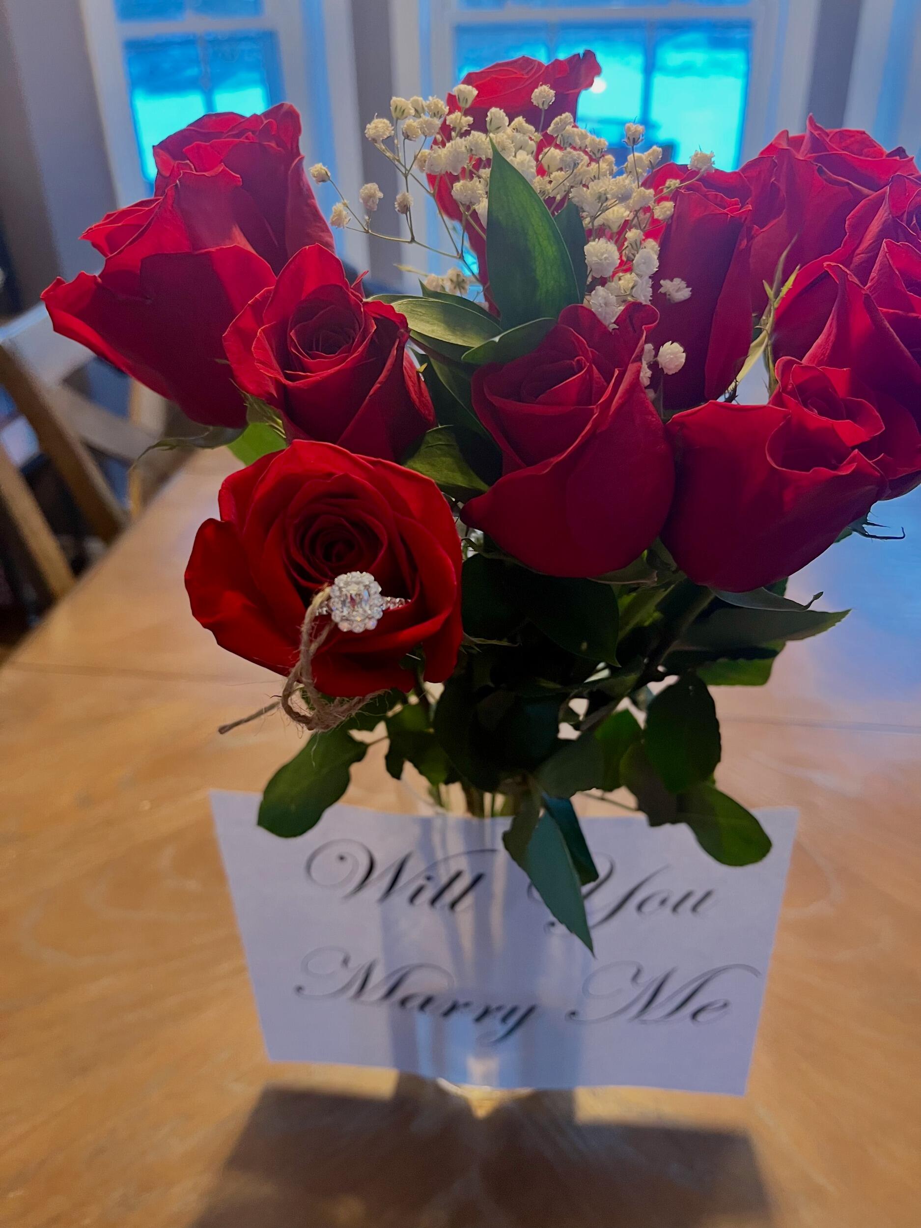 On Christmas Eve, as they were getting ready to head out, DJ completely surprised Megan by proposing.
Her exact response?
"Are you *bleeping* kidding me?!”
Then, of course- she said yes.