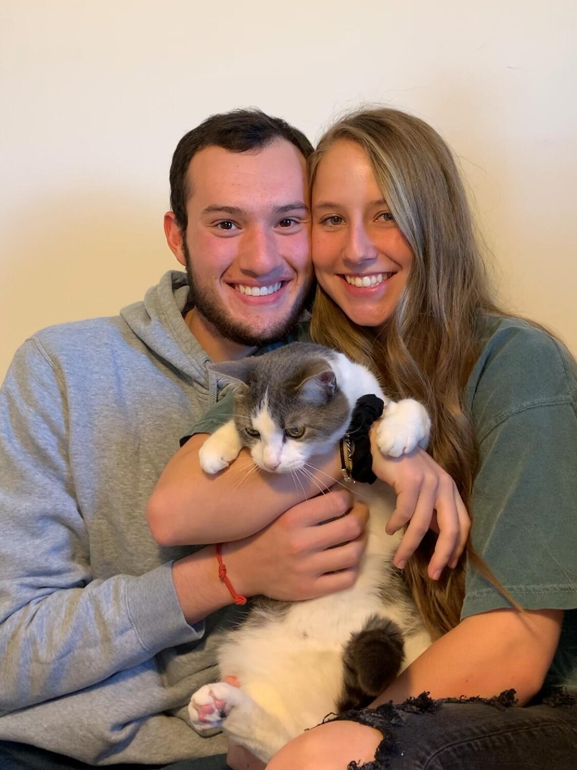 We came home from school and had to go a few months without each other during COVID. We got together for Bailey's birthday though! Ft. Mr. Kitten, our first cat.