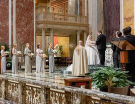 priest officiating traditional Catholic wedding 