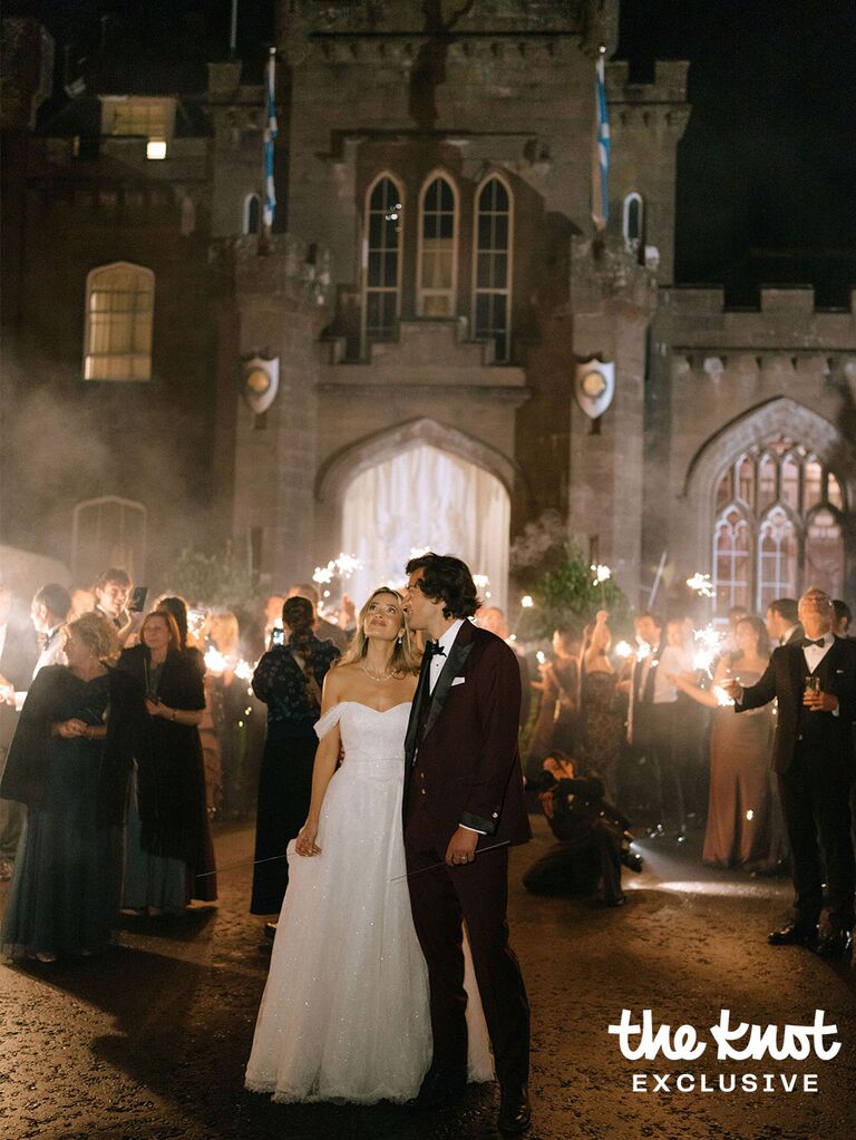 Logan Rae Hill and Joey Kurbanov watching fireworks at their wedding reception