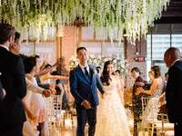 bride and groom recessional with gold confetti