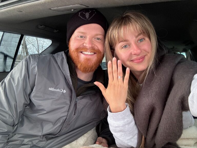 Kiefer proposed at night by the fire while we were camping in KY!