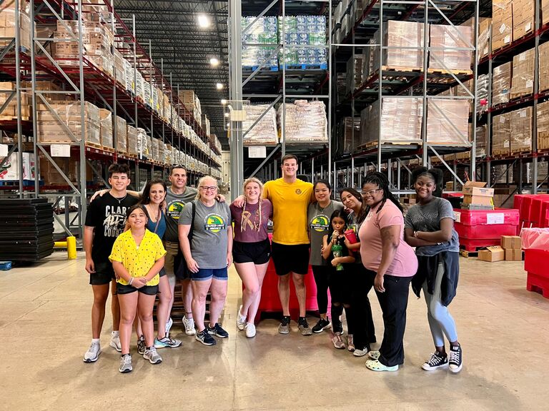 Erik meeting my work fam at the food bank and really doing the heavy lifting (literally)
