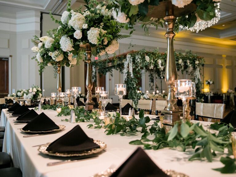 Reception table with floral centerpieces