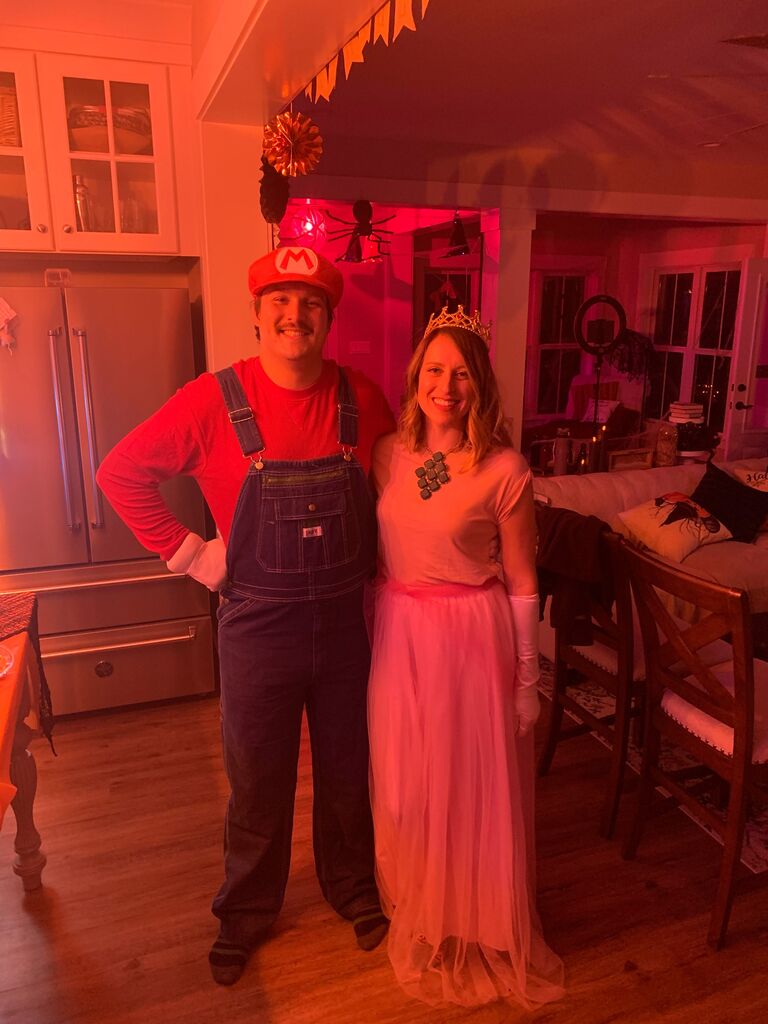 Our first Halloween together as Mario and Princess Peach...yes, Logan's mustache is real! 