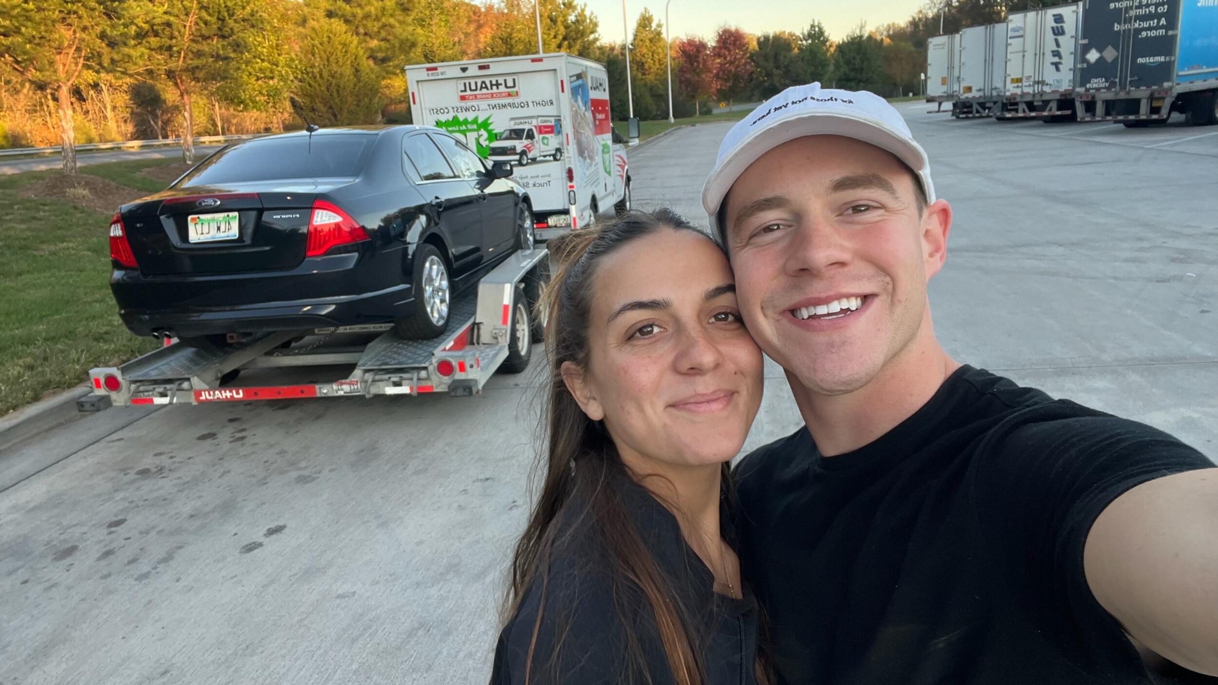 These two have gone through some "fun" challenges, but not even a shattered, broken car could steal their joy.