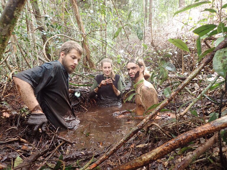 This is basically where we met, falling in muddy holes while trying to help restore the rainforest. Our story isn't too glamorous, but we were both in the right place, at the right time, doing things that we cared about. We met in 2017, while Brendan was volunteering with a conservation non-profit in Indonesian Borneo where Jenn was working. We bonded over our love of nature, and Jenn found herself smitten with Brendan's eclectic sense of humor! 