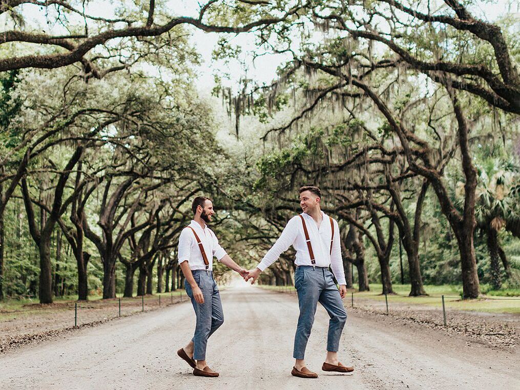 Couple Holding Hands on Tybee Island in Georgia