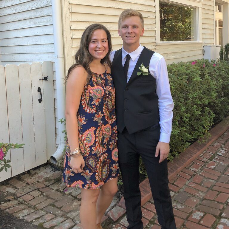 Rylie and Oscar at a family wedding. This was their first wedding together.