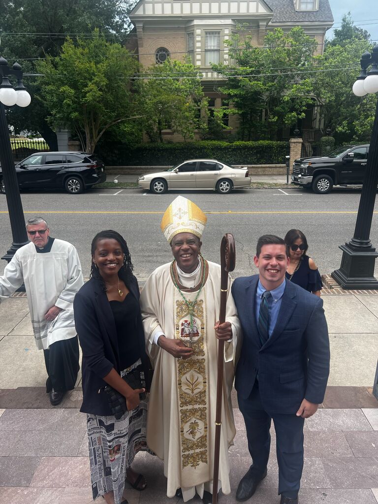 June and Danny are blessed by Bishop Jacques Fabre-Jeune