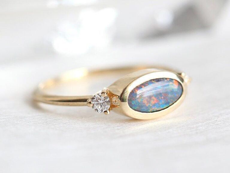 Bezel set black opal engagement ring