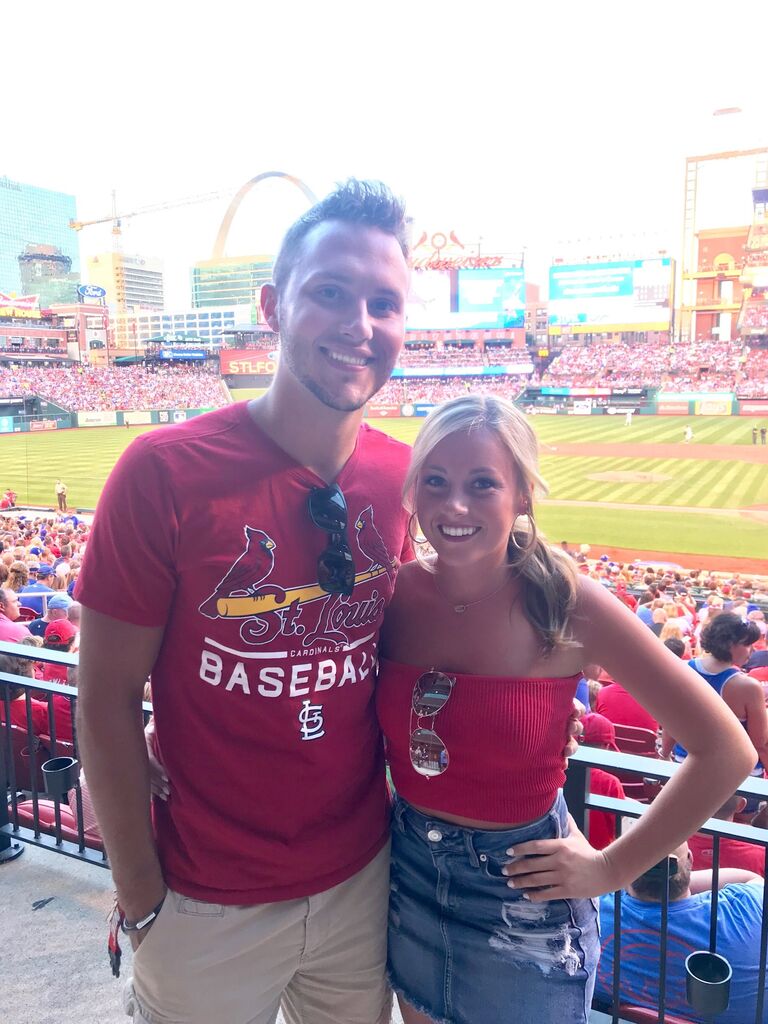 Enjoying what they love most together...Cardinals Games!