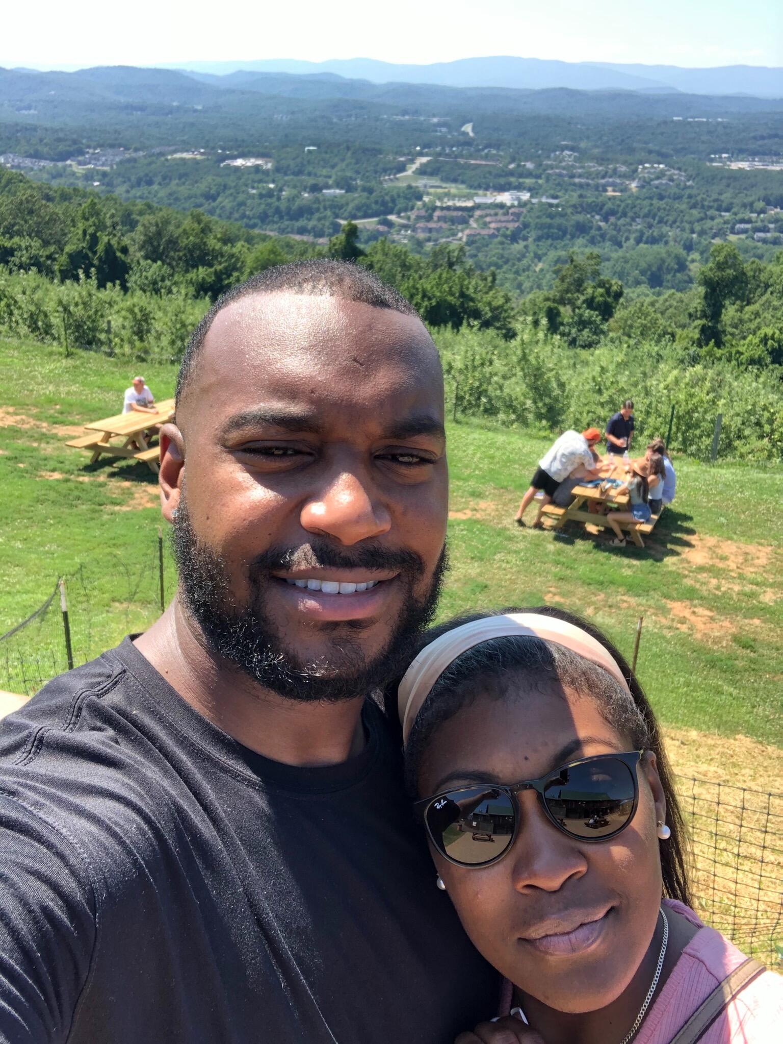 Our spontaneous and fun-filled dates have been a staple in our relationship. Here we are at one of our favorite spots in Charlottesville, Carter’s Mountain (You have to go and try the fresh homemade Apple Cider Donuts). 