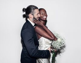 Happy wedding couple posing for a portrait