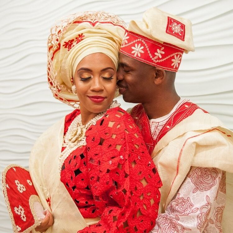 Nigerian bride and groom sharing embrace
