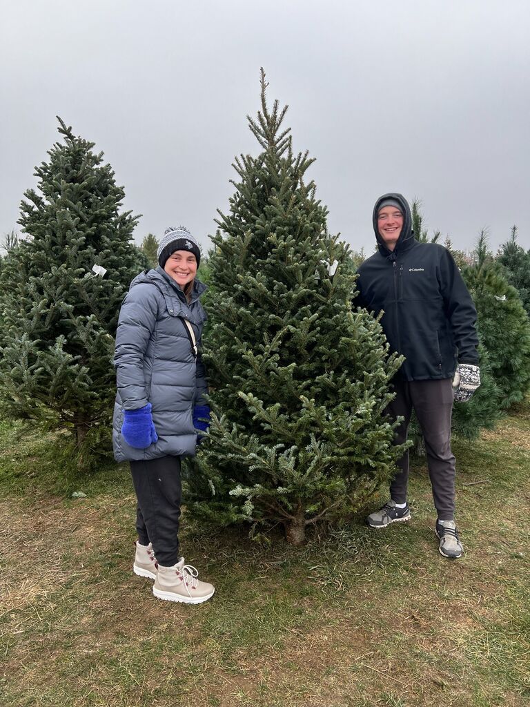 Our 3rd Christmas together. We love picking out our tree every year.