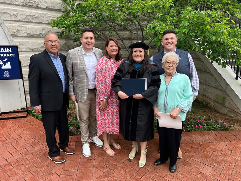 Then KJ graduated with her Doctorate from Belmont in May