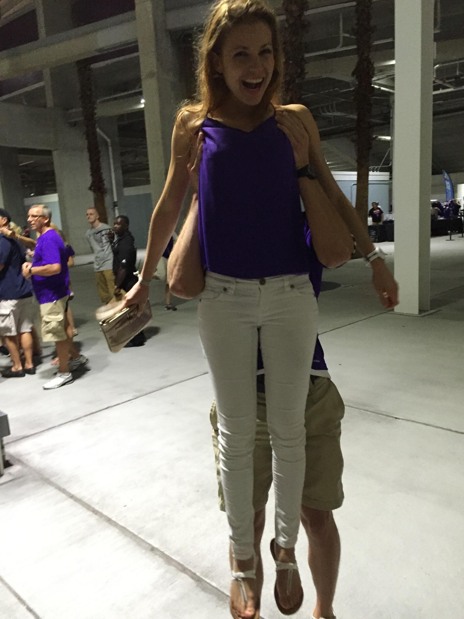 Purple & white for the Orlando city soccer game. Monica is ready for a header!