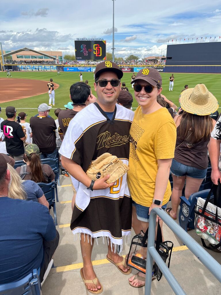 Andrew taught Julie how to like baseball.
