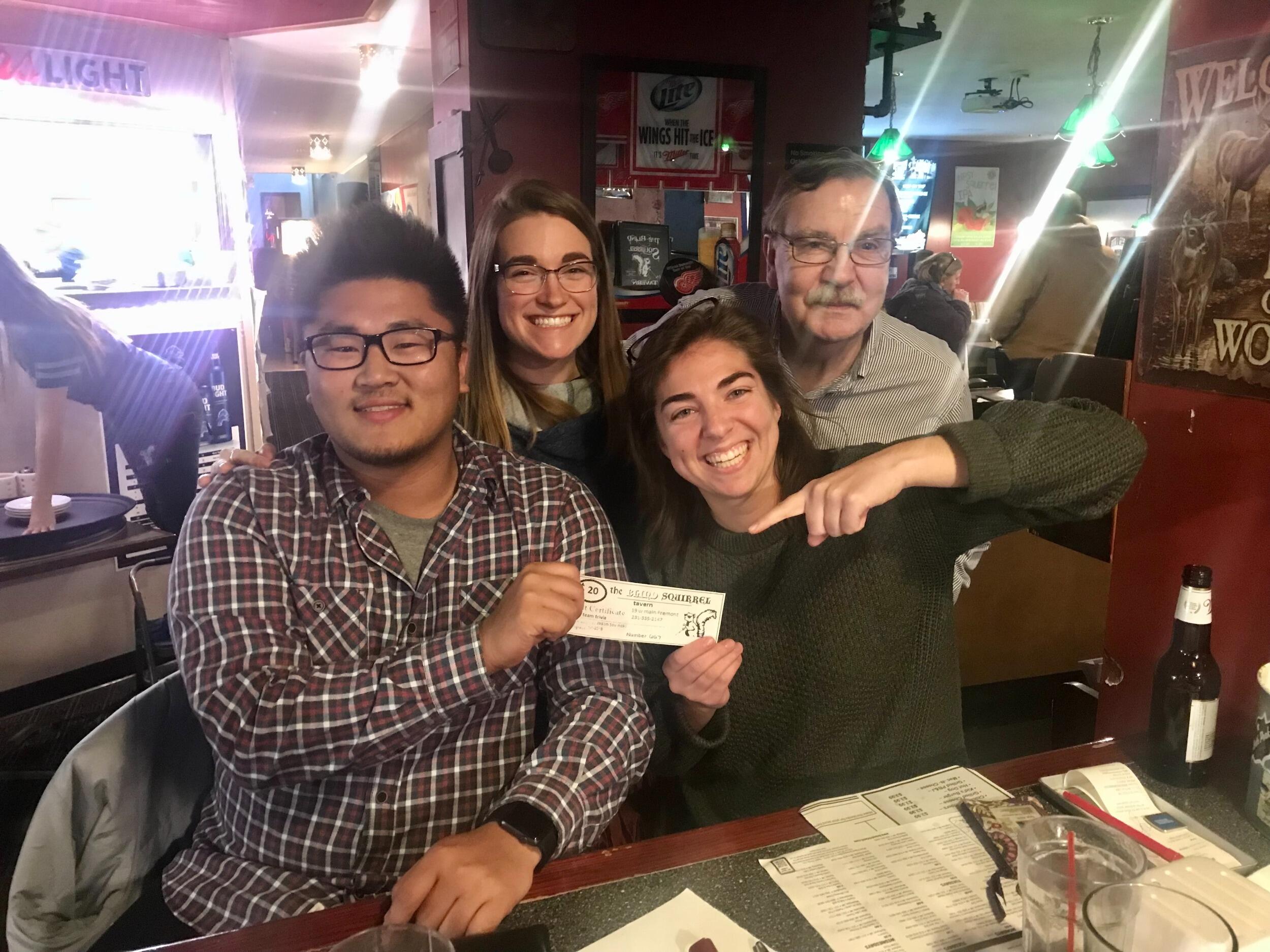 We met while working for a baby food company in Fremont, Michigan. We joined a trivia team at the local bar - The Blind Squirrel. We were just friends, but coworkers and fellow trivia team members thought there was potential for more. 