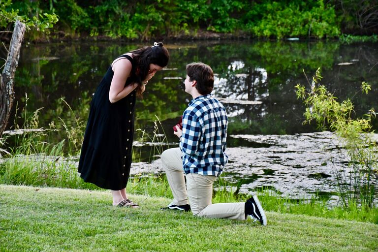 Caleb proposed to Shelby in Arkansas! Shelby started the day early by driving to AR. We went to church and ended the day at my dads house with a cookout. After hanging out around the fire we took some family photos. I popped the question and she said YES! This day was one year after we said "I love you!"