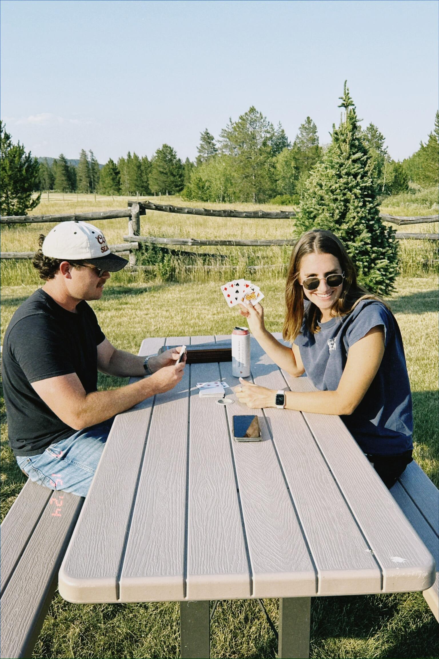 Teaching Fran cribbage during Watson Family Vacation to Yellowstone