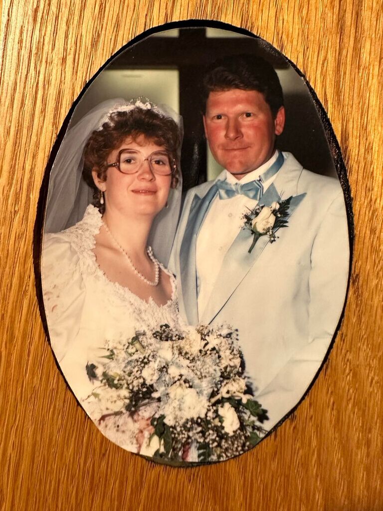 Amy and Maynard Hubbard (aunt and uncle/godparents of the groom)