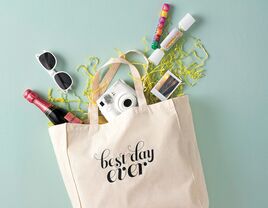 DIY printed canvas welcome tote with sunglasses champagne camera