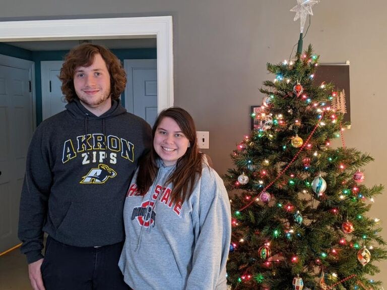 Setting up the Christmas tree in Madyn's first apartment in Cincinnati