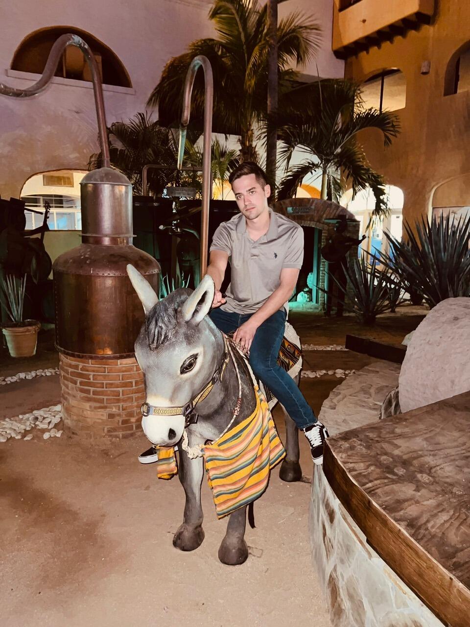 Brian rode a donkey in Mexico. His name is Jeff.
