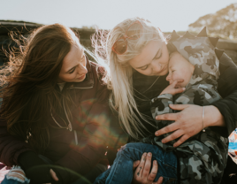 Couple looking after child 