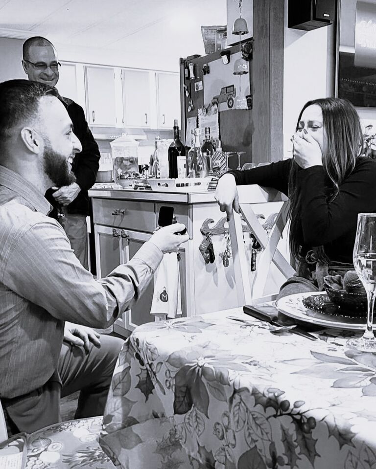 On their fourth Christmas together, Josh surprised Molly on Christmas morning in Florida with both of his parents. He asked her to marry him and she said "yes" surrounded by family and loved ones.