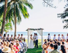 Long banquet table with chiavari chairs at destination wedding reception venue