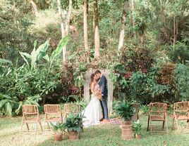 Couple exchanging their vows in a jungle landscape