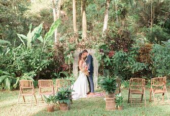 Couple exchanging their vows in a jungle landscape