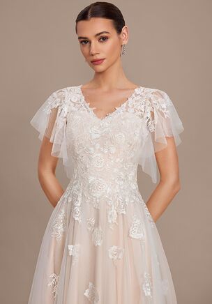 Fall in love with the JJ's House Betony A-line Lace Wedding Dress! A timeless and elegant design crafted to make your dream wedding a reality. Shine with confidence as you walk down the aisle.