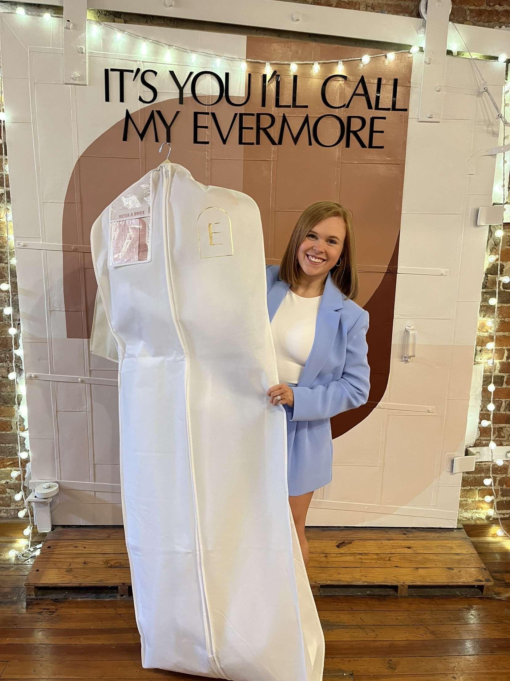 Bailey picks up her wedding dress