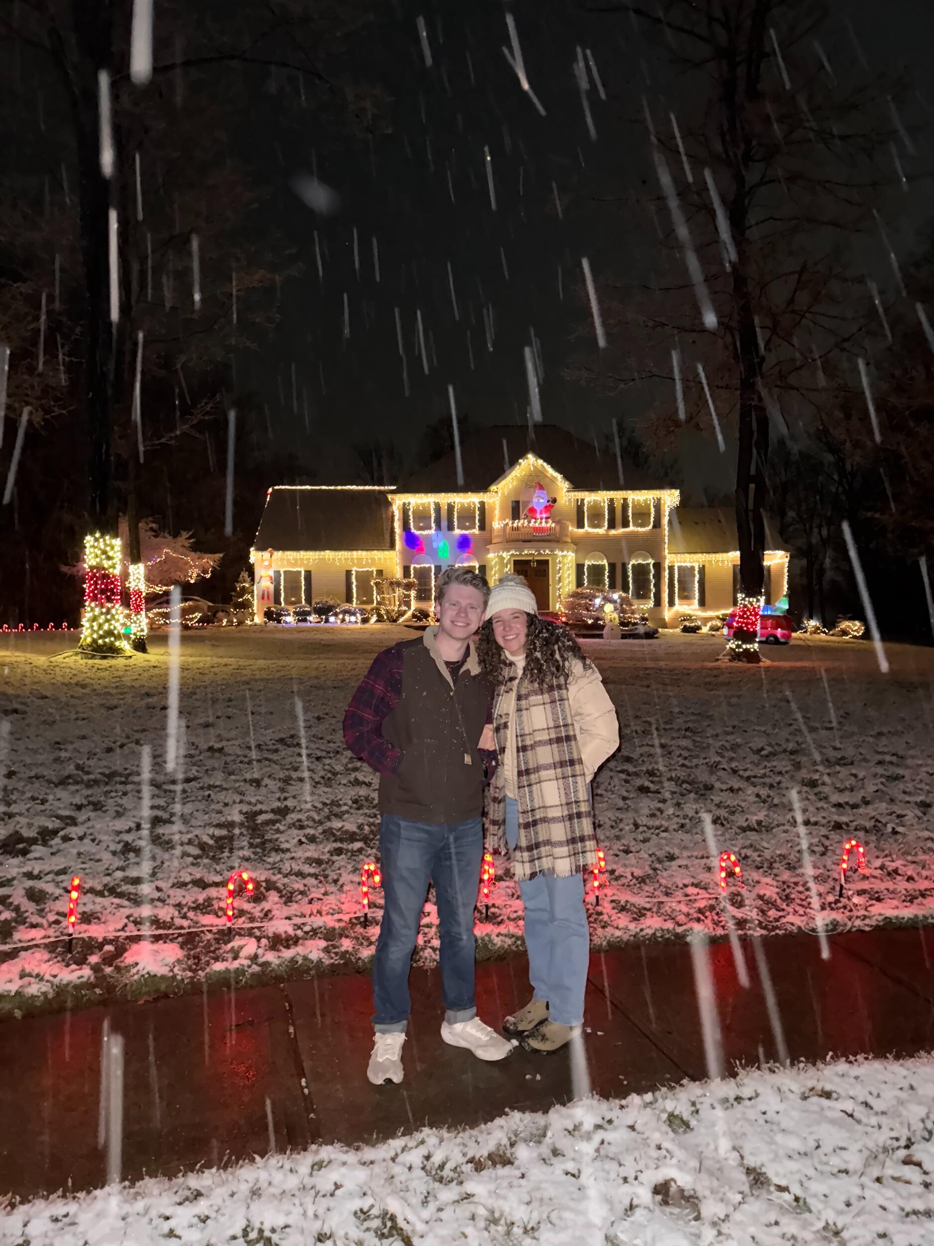 Right before Christmas, they were able to meet each other's families for the first time. This photo was taken in Em's neighborhood in New Jersey on a walk with her dad and the Spelman family dog, Bella.