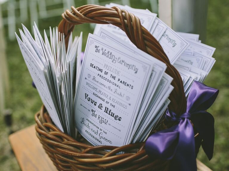 Wedding ceremony programs in a basket