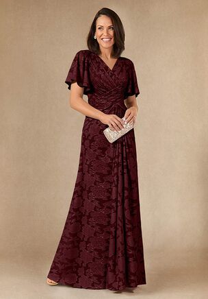 Emmeline is an all over Floral Burnout A-line gown. The bodice is hand pleated in an over under design which accentuates the figure. The circular flounce sleeves add upper arm coverage without overheating. This is a simple yet chic design suitable for any occasion.